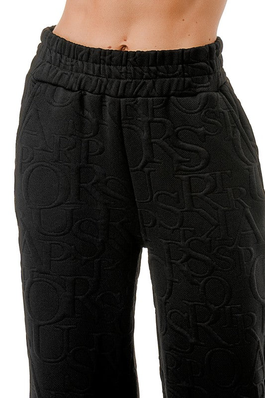 JAQ20-PANT JACQUARD LETTER EMBOSSED STRAIGHT PANTS