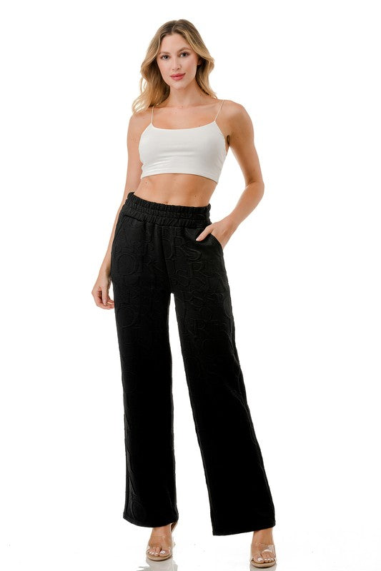 JAQ20-PANT JACQUARD LETTER EMBOSSED STRAIGHT PANTS