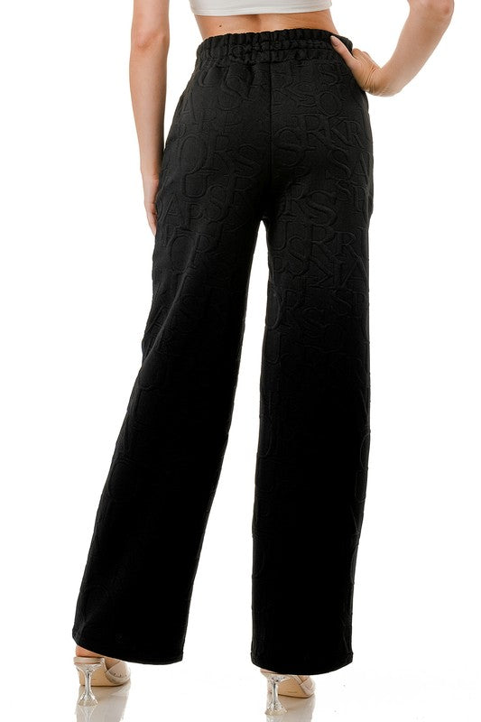 JAQ20-PANT JACQUARD LETTER EMBOSSED STRAIGHT PANTS
